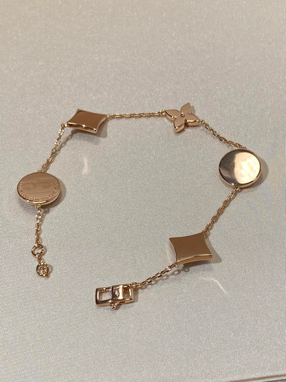 [Dawnora Jewelry]STAR AND SUN 5 MOTIF MOP PINK GOLD BRACELET